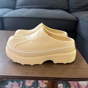 Beige Sorel Caribou Clogs